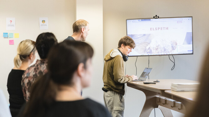 Lawson showing the Rocketspark team what it's like navigating a website with a screen reader